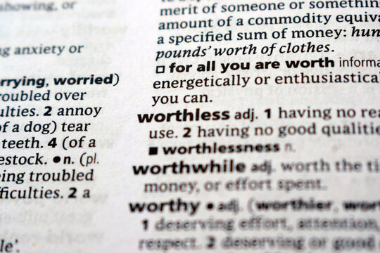 English Dictionary Page Close Up With The Word Transcription Of -worthless