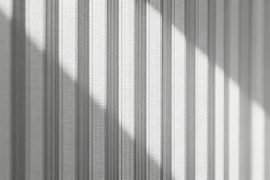 Soft Light Filtering Through Vertical Sheer Curtains