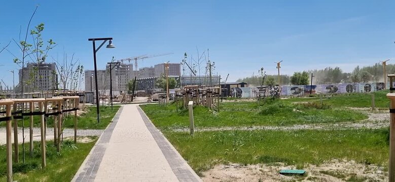 City Park with Modern Residential Buildings in the Background, Kyzylorda, Kazakhstan