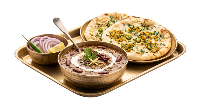 Traditional Indian meal platter of creamy dal makhani with butter masala kulcha flatbread, sliced onions, and lemon served on a brass tray isolated on a transparent background 
