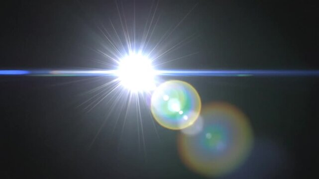 Bright light flare effect with colorful bokeh on a dark background