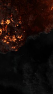 Vertical bright fire explosion filling screen on black background, seamless loop