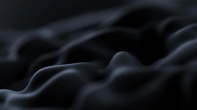 Abstract close-up of flowing black fabric creating soft, undulating waves. Represents elegance, texture, and fluidity in design and art