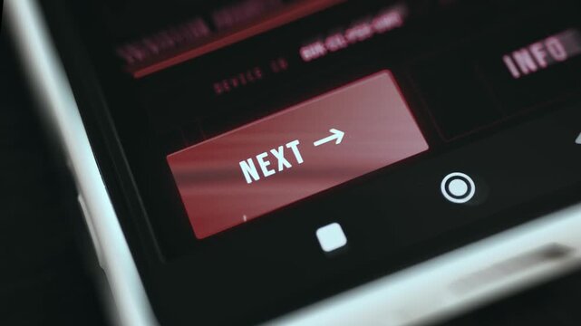Red NEXT button being tapped by user
