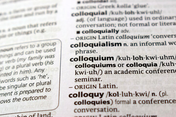 Fototapeta premium Close Up Of English Explanation Dictionary Page Word Of - colloquium