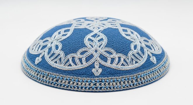 Blue embroidered kippah isolated on white background