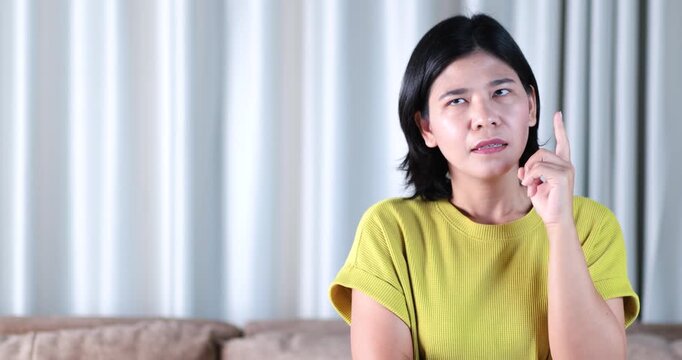 Thinking idea, Thoughtful Asian woman and touching her temple, serious expression, doubt, decision, choice, unsure in solution, thinking finance, problem solving, decision making, personal budgeting