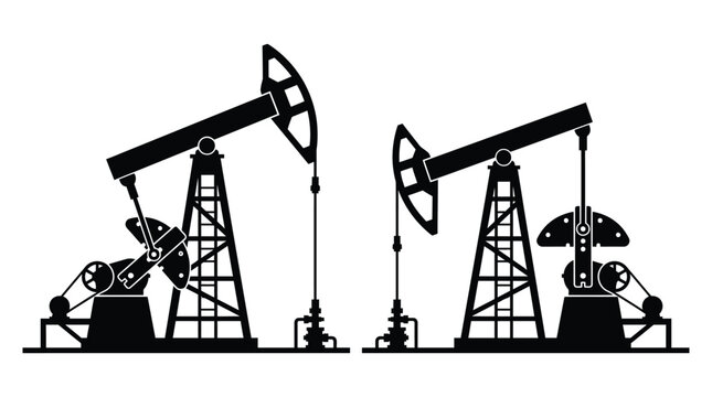 Oil pump jacks in black silhouette well