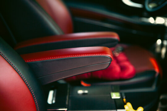 Red leather car seats. Interior of a modern car.