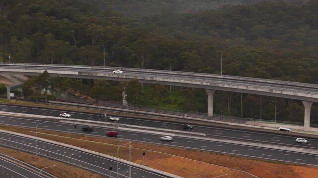 Aerial drone view of vehicles using the newly opened M7 -M12 Interchange at Cecil Hills, Sydney, NSW Australia on the morning of 14 June 2026