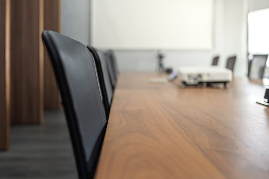 empty modern business meeting room with arranged conference tables and chairs