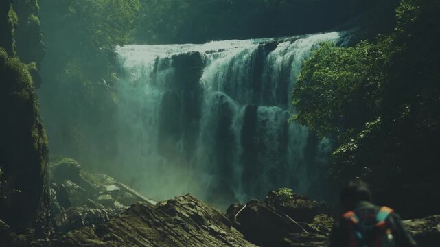 Experience the majestic Sathodi Waterfalls in Karnataka, India, flowing through the lush Western Ghats. A powerful cascade amidst vibrant, misty forest, perfect for nature tourism and adventure.