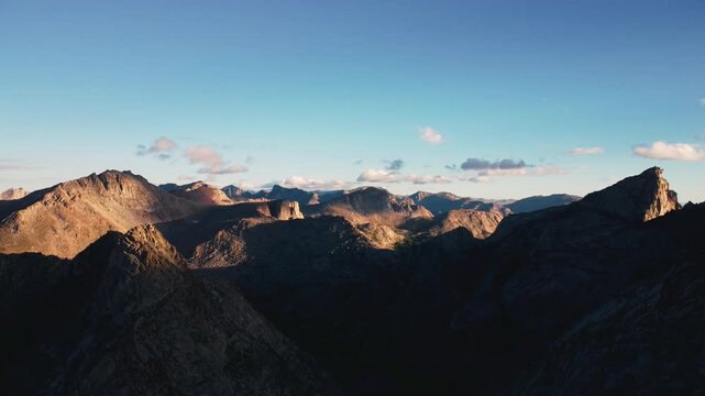 Cinematic aerial footage of the Wind River Range in Wyoming showcasing dramatic mountain ridges along the Continental Divide Trail.