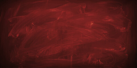 A close-up view of a textured, dark red chalk board, revealing subtle smudges and patterns of chalk dust, evoking a sense of rustic artistic expression or educational background. © Black art
