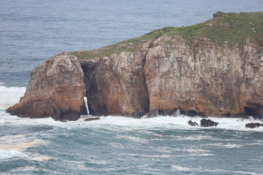 The Herbosa island in Cabo Penas cape, the northerly territory of Asturias, Spain