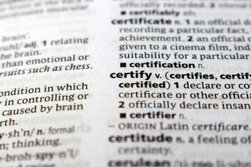 Fototapeta premium Close Up English Dictionary Page With The Word Translation Of - certify