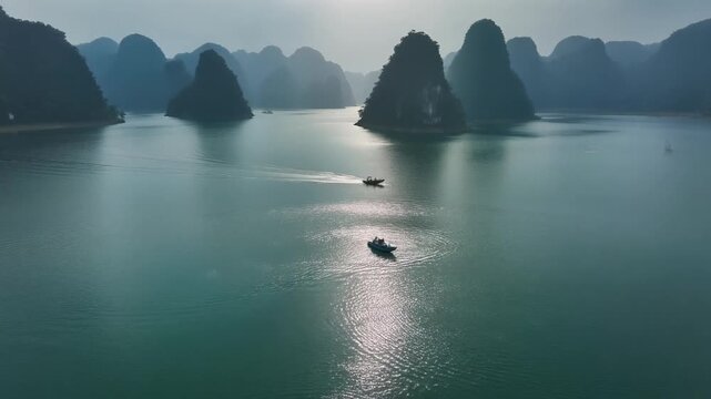 Tuyen Lam Lake aerial view with boats cruising calm water