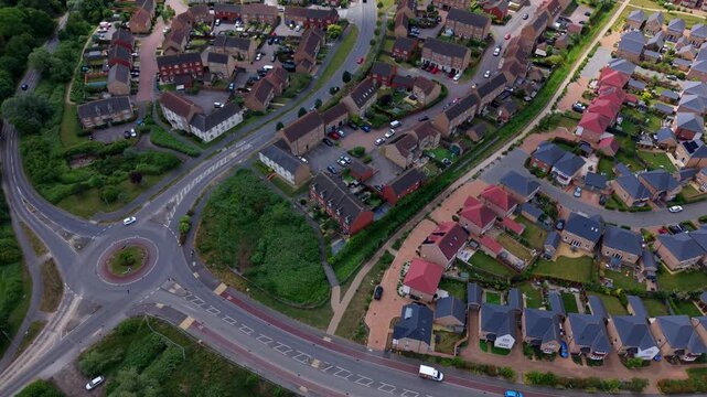 High angle view of residential housing expansion in Ely comparing new architectural designs with old neighborhood layouts