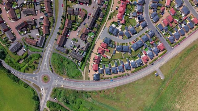 High angle view of residential housing expansion in Ely comparing new architectural designs with old neighborhood layouts
