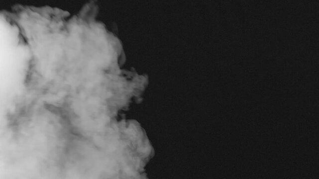 Jets of Smoke in a Stream of Air. Jets of white smoke burst onto the screen and are immediately blown away by a stream of air