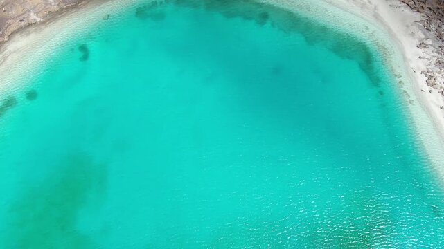 Aerial view of turquoise Milk Lake surface in Daocheng Yading China
