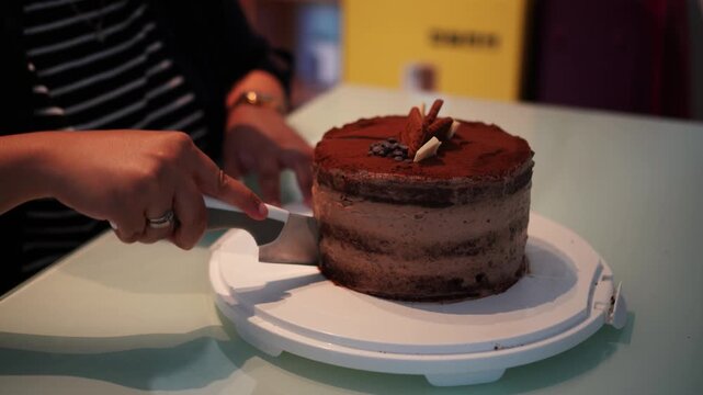 Chocolate Cake Cutting With Knife on Cake Stand Static Shot