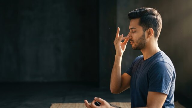 Young Man Practicing Pranayama &ndash; Breathwork and Mindfulness