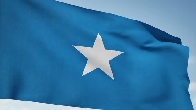 Somali flag with solid light blue field and centered white five-pointed star waving against pale sky, wide video smoothly zooming into close-up, concept of Somali national identity and unity