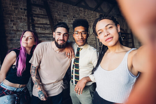 Selfie portrait of happy diverse friends