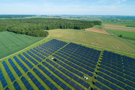 Germany, Bavaria, Aerial view of countryside solar farm in spring