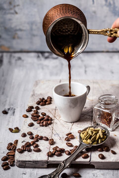 Pouring Arabian Coffee into cup