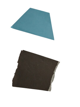 Two separate flat geometric shapes including a blue trapezoid and a dark textured square piece isolated on transparent background