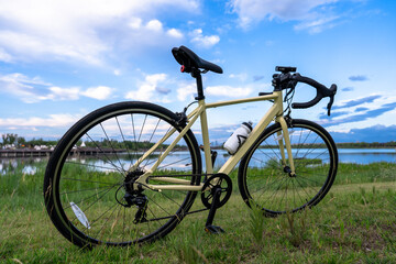 Fototapeta premium Bicycle riding by the lake in summer