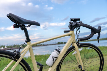 Fototapeta premium Bicycle riding by the lake in summer