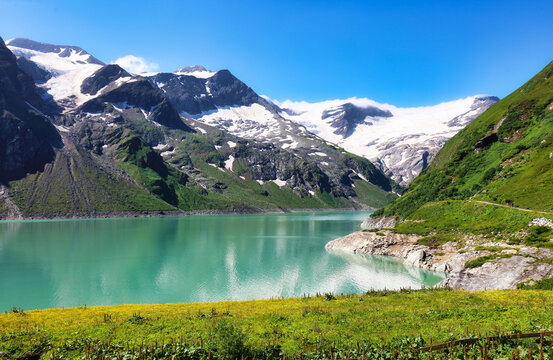 Idyllic summer landscape with clear mountain amd alpine lake in the Alps, Austria - Hohe Tauern near Kaprun, Mooserboden