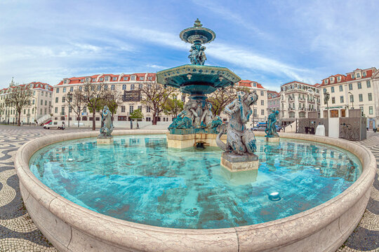 LISBON, PORTUGAL - APRIL 5, 2024: The South Fountain of Rossio, known as Fonte Sul do Rossio, one of the two beautiful Baroque fountains located in Rossio Square (Pra&ccedil;a Dom Pedro IV),installed in 1889