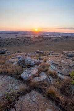 Sunrise over Highveld landscape with rocky outcrop