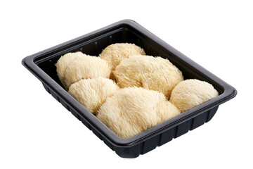 Fresh Lion’s Mane mushrooms, packed in a black plastic tray, isolated on white background with clipping path. Gourmet edible fungus valued for culinary use and functional nutrition. © DEWINs