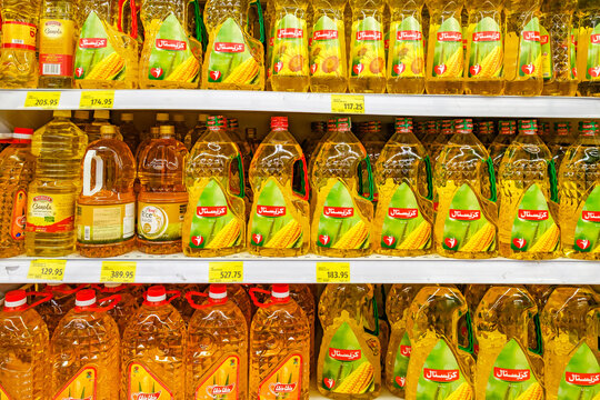 Hurghada, Egypt &ndash; february 25, 2026: sunflower and corn oils in bottles on supermarket shelves