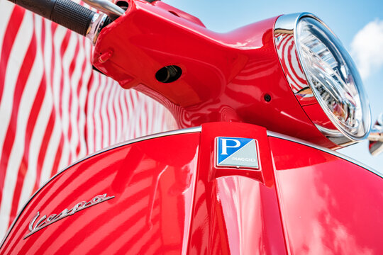Munich, Germany - August 18:typical italian Vespa Motorscooter (build from Piaggio) at a street in munich on August 18, 2025