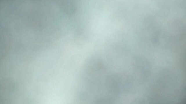 Amber rising cloud ink diffusion blooming in water 4K loop