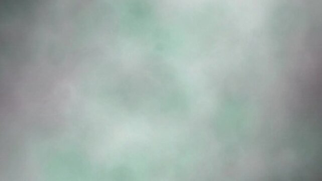 Emerald falling tendril ink diffusion blooming in water 4K loop