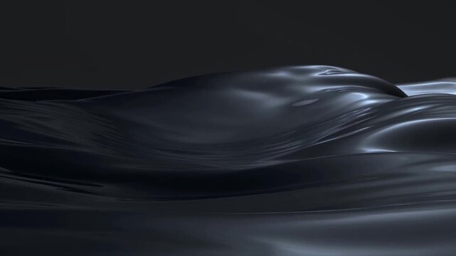 Smooth black liquid waves gently undulating in a dark environment. Represents fluidity, elegance, and the beauty of motion in design and art