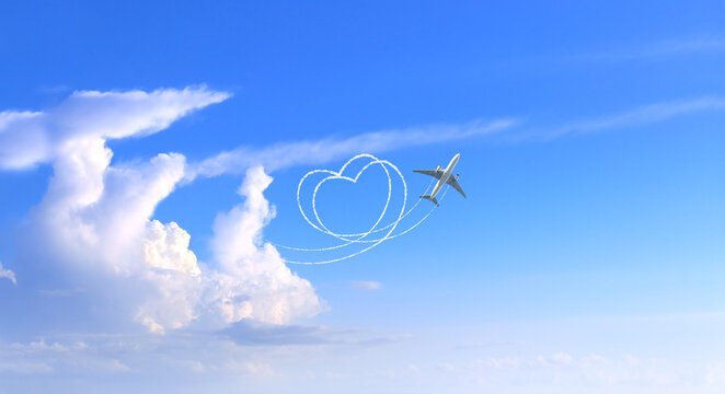 Horizontal background with aircraft on cloudy sky. Airplane drawing a heart in sky. Jet flight route of aircraft in shape of a heart in blue sky. Topic of holiday, travel, trip abroad on vacation