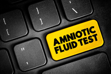 Obraz premium Amniotic Fluid Test is a medical procedure used primarily in the prenatal diagnosis of genetic conditions, text button on keyboard, concept background