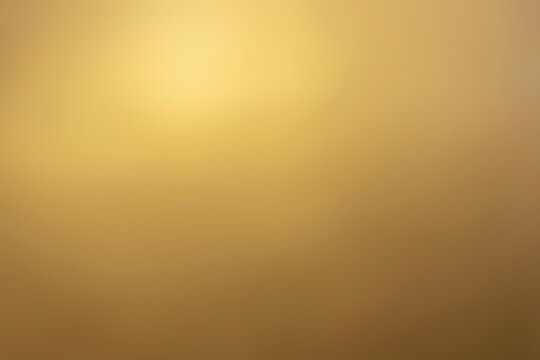Elegant golden gradient background with smooth luxury metallic texture.