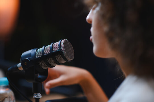 Content creator recording podcast in home studio