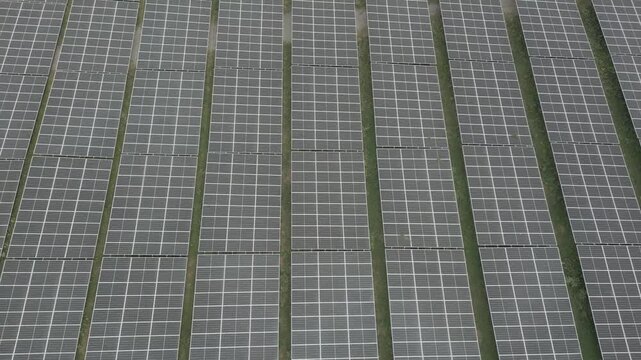 Solar panel at at the solar farm. Renewable energy. Clean Sustainable Energy . Aerial drone shot