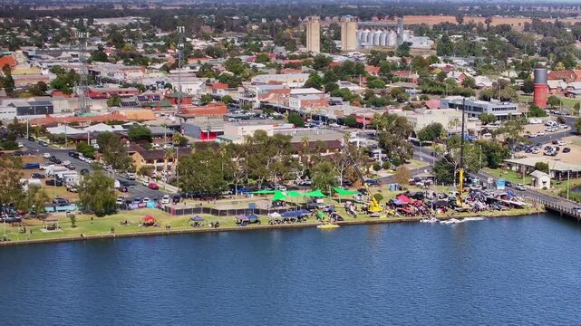 Aerial view of Griffith Cup pits and cranes beside Lake Mulwala