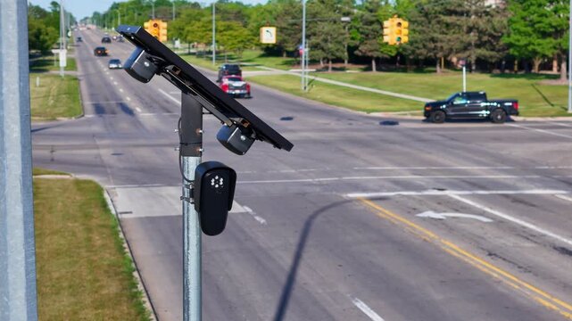 Solar-powered Flock traffic cameras monitoring intersection in Brownstown, Michigan, USA